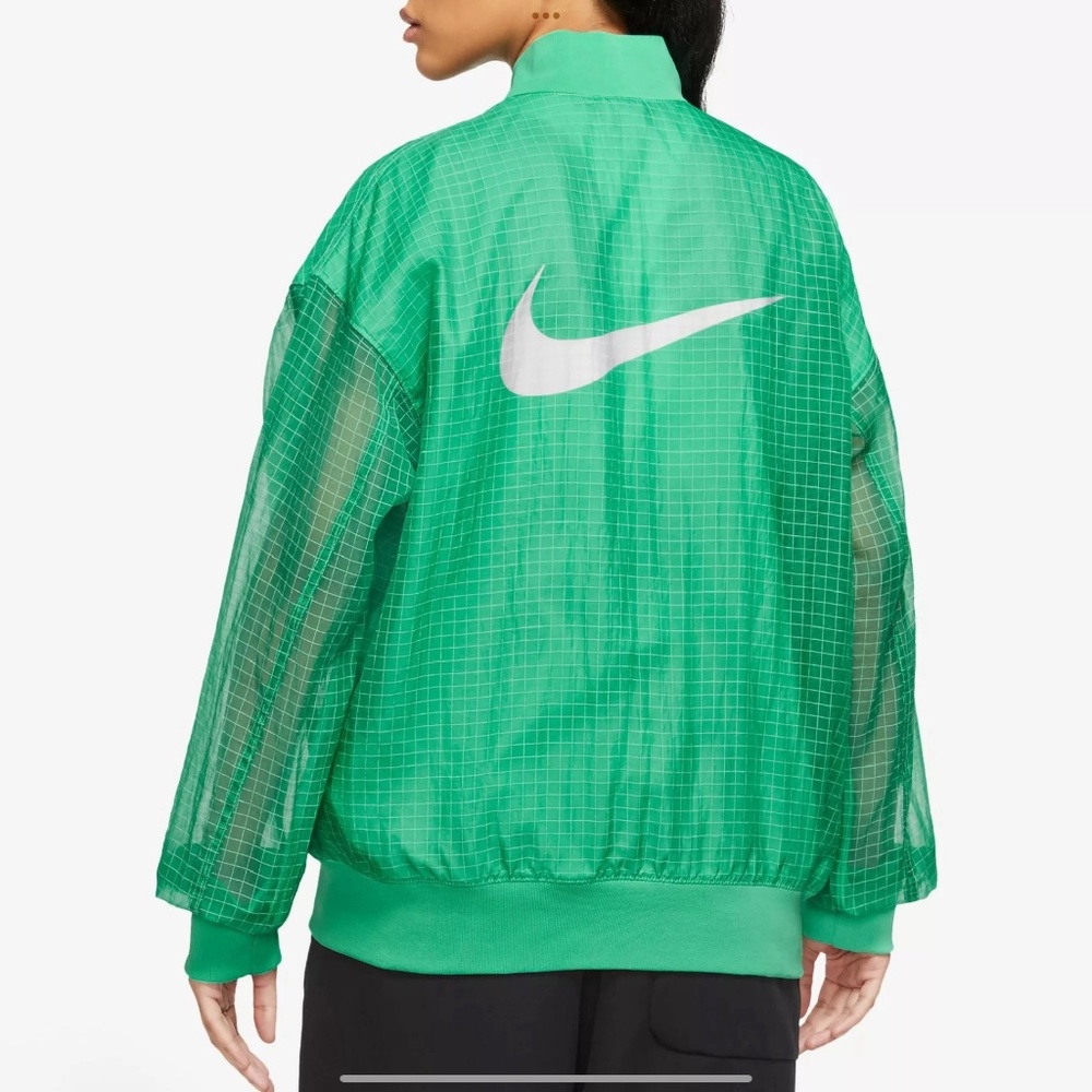 Womens nike sportswear essential woven varsity Green Sz. Large